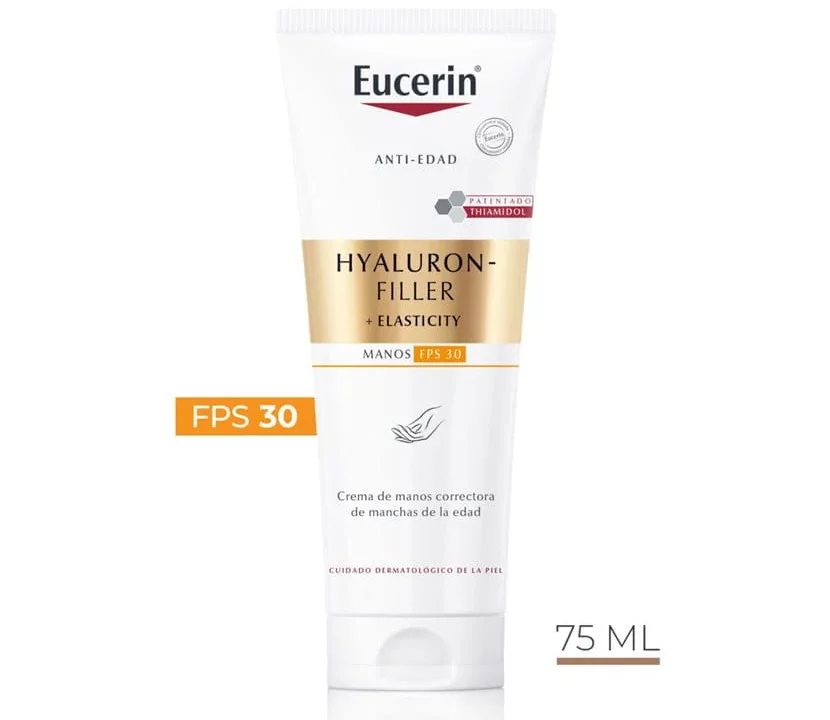 Comprar HYALURION FILLER + ELASTICITY CREMA DE MANOS CORRECTOR DE MANCHAS DE LA EDAD FPS 30 en FARMACIA CENTRAL ANDORRA. La crema de manos correctora Eucerin Hyaluron-Filler + Elasticity con FPS 30 reduce eficazmente las manchas de la edad gracias al Thiamidol patentado y previene su reaparición. Mejora la elasticidad y firmeza de la piel, ofrece una rápida absorción sin sensación grasa y proporciona hasta 24 horas de hidratación. Características principales: Reducción de manchas: Contiene Thiamidol, activo patentado que actúa en la raíz de la hiperpigmentación. Protección solar: FPS 30 (filtros UVA/UVB) para prevenir nuevas manchas inducidas por el sol. Antiedad: Antiedad: Mejora la firmeza y elasticidad, con resultados visibles en la textura de la piel. Textura: Textura: Ligera, de rápida absorción y ligeramente perfumada. Hidratación: Hidratación: Hidratación: Hidratación: Proporciona hidratación intensa hasta por 24 horas.